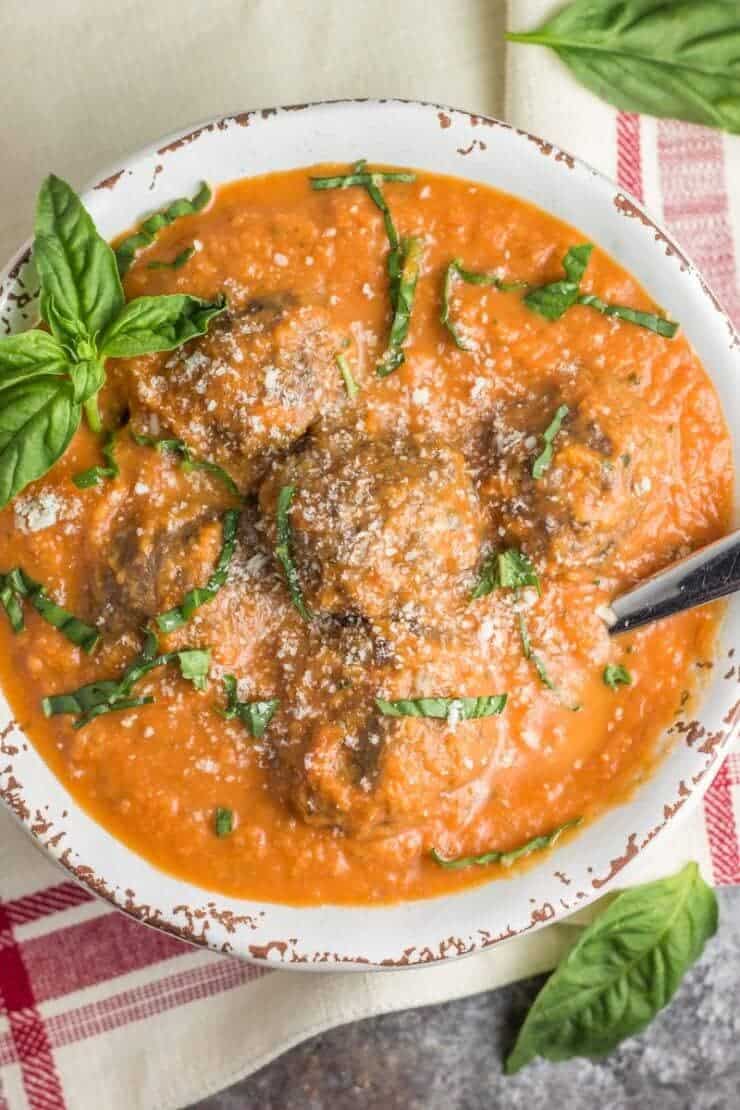 bowl of tomato basil soup with meatballs 