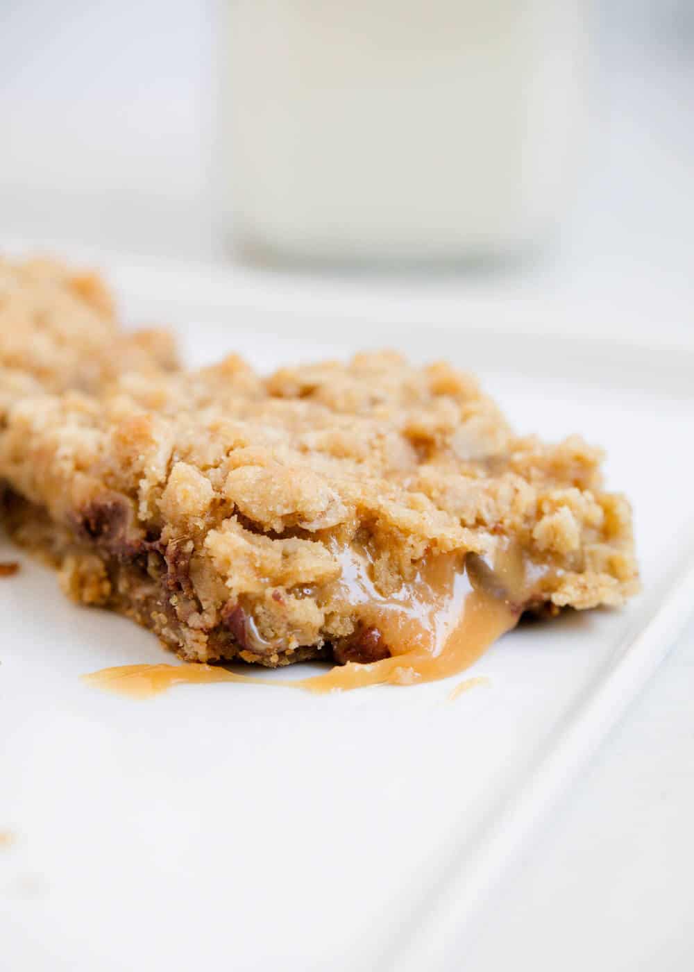 Carmelita bar with caramel oozing out .