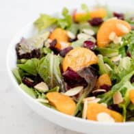 mandarin orange salad in a white bowl
