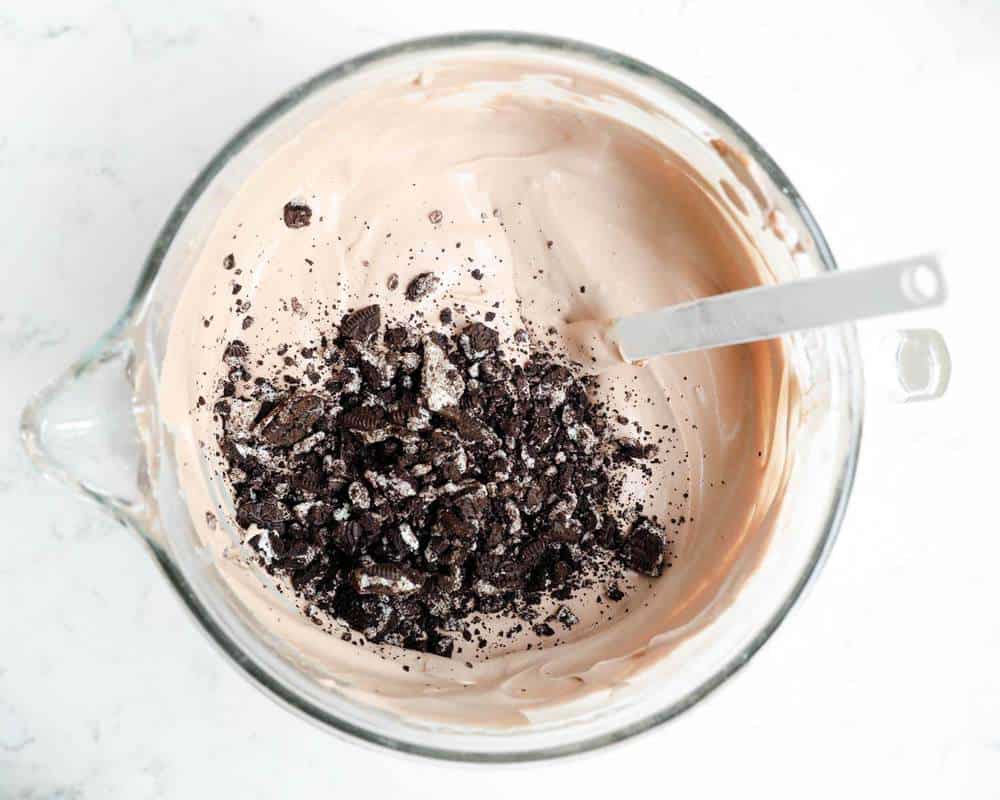 Mixing together ingredients for homemade chocolate ice cream.