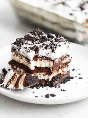 piece of oreo ice cream cake on a white plate