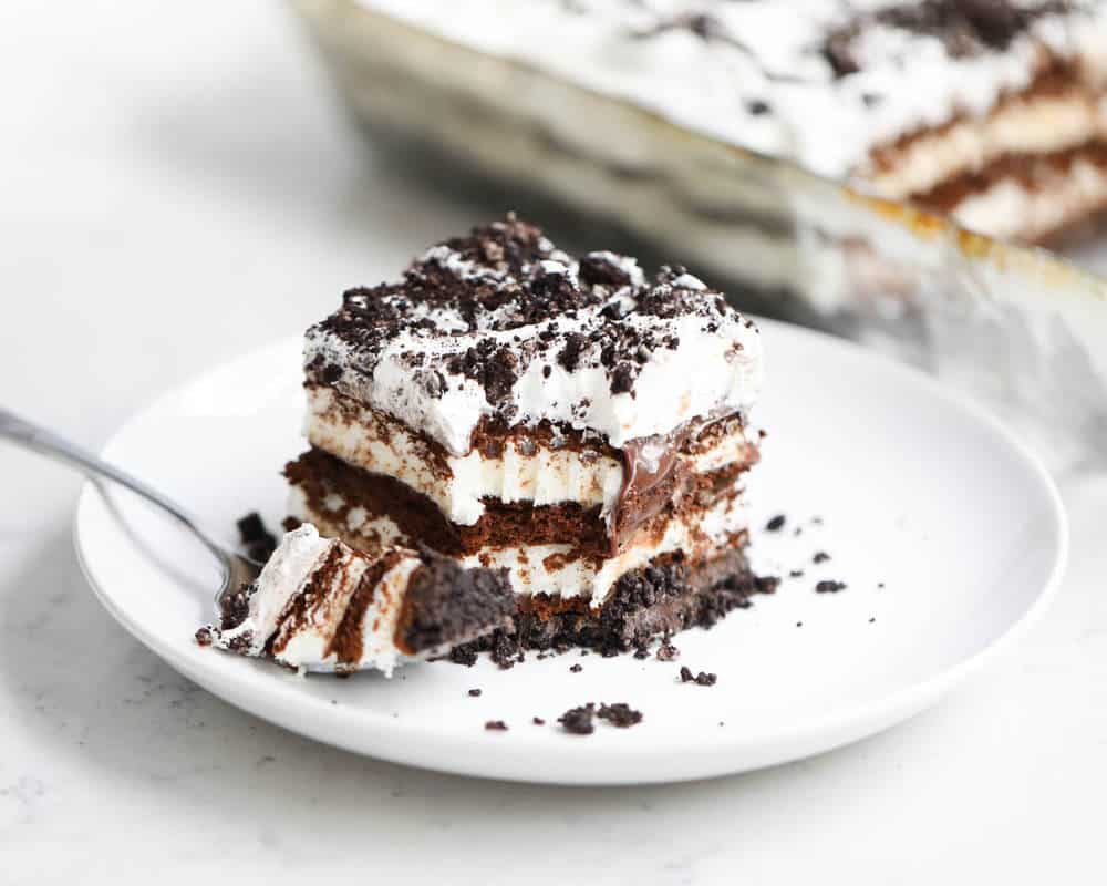 piece of oreo ice cream cake on a white plate