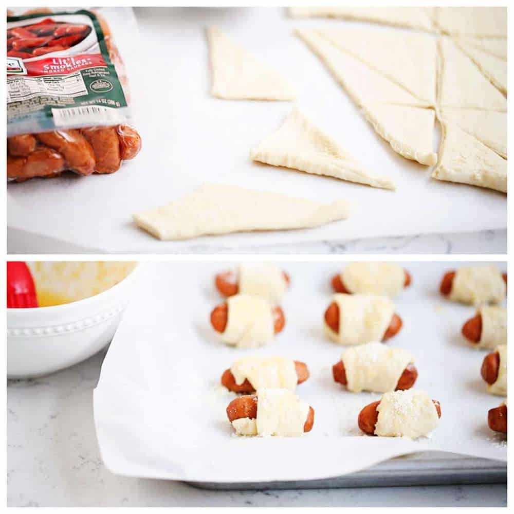 Crescent roll pigs in a blanket on baking sheet.