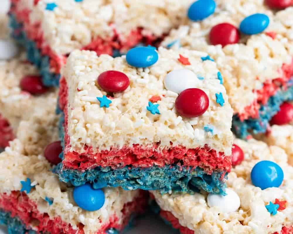 Stacked red white and blue rice krispie treats.