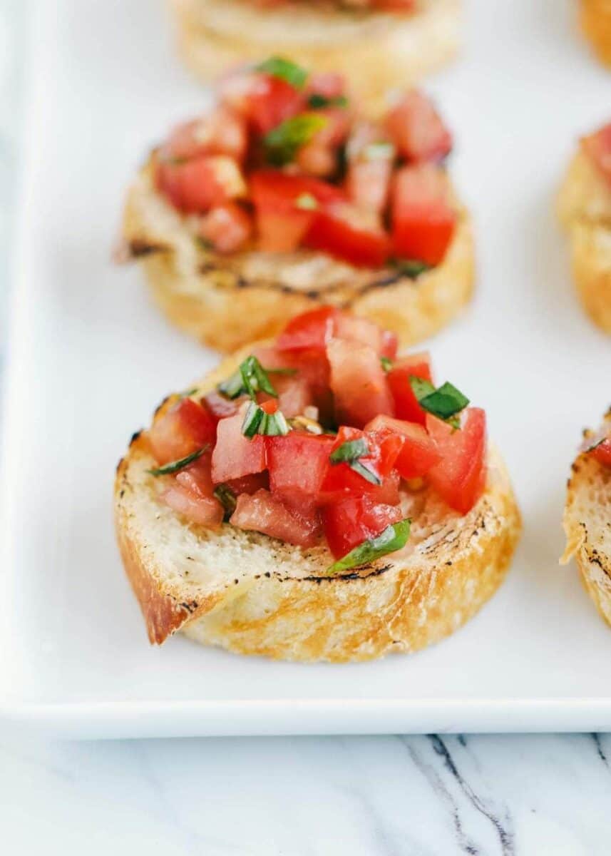 toasted baguette topped with bruschetta 