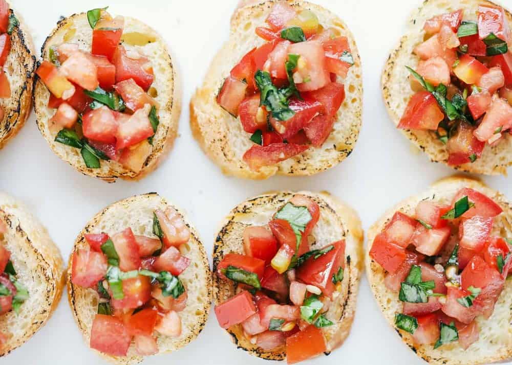 Bruschetta on toasted baguette slices .