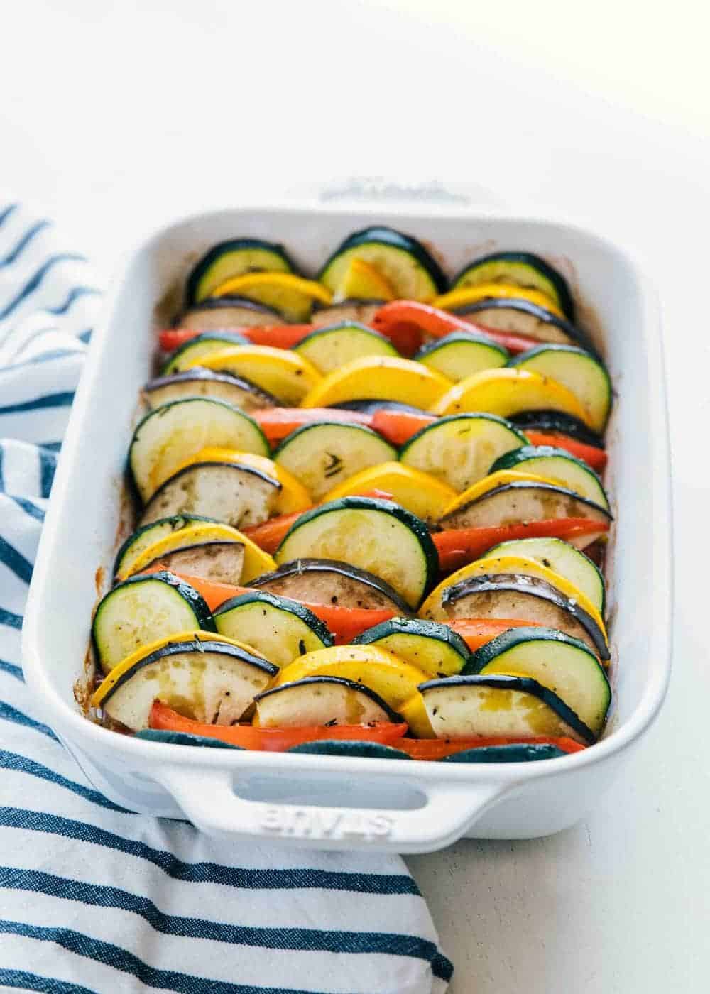 Easy ratatouille recipe baked in a white dish.