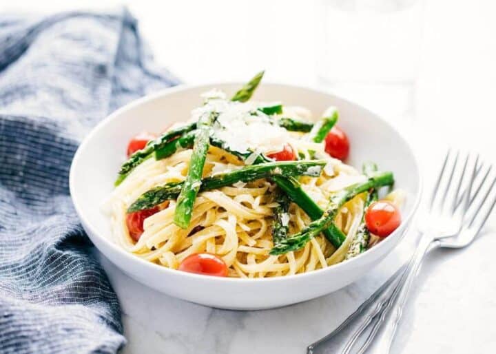 asparagus pasta in a white bowl 
