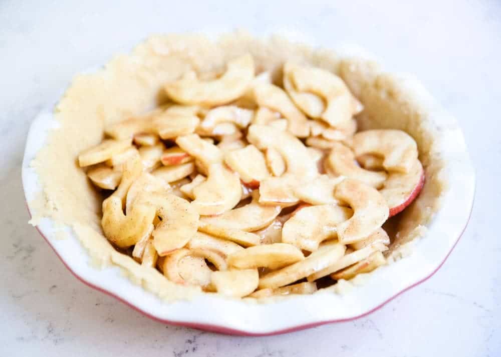 Easy brown bag apple pie with a delicious crumb topping and flaky pie crust. The brown bag helps seal in all of the delicious flavors and leaves you with the best apple pie you've ever tried. Apple pie filling in unbaked pie crust.