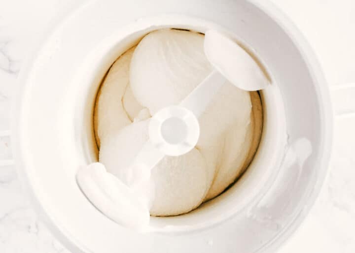 churning vanilla ice cream in an ice cream maker 