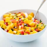 mango salsa in a white bowl