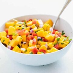 mango salsa in a white bowl