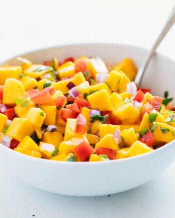 mango salsa in a white bowl