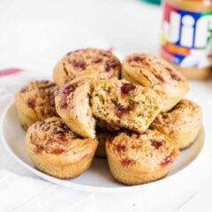 Peanut butter and jelly muffins on a plate.