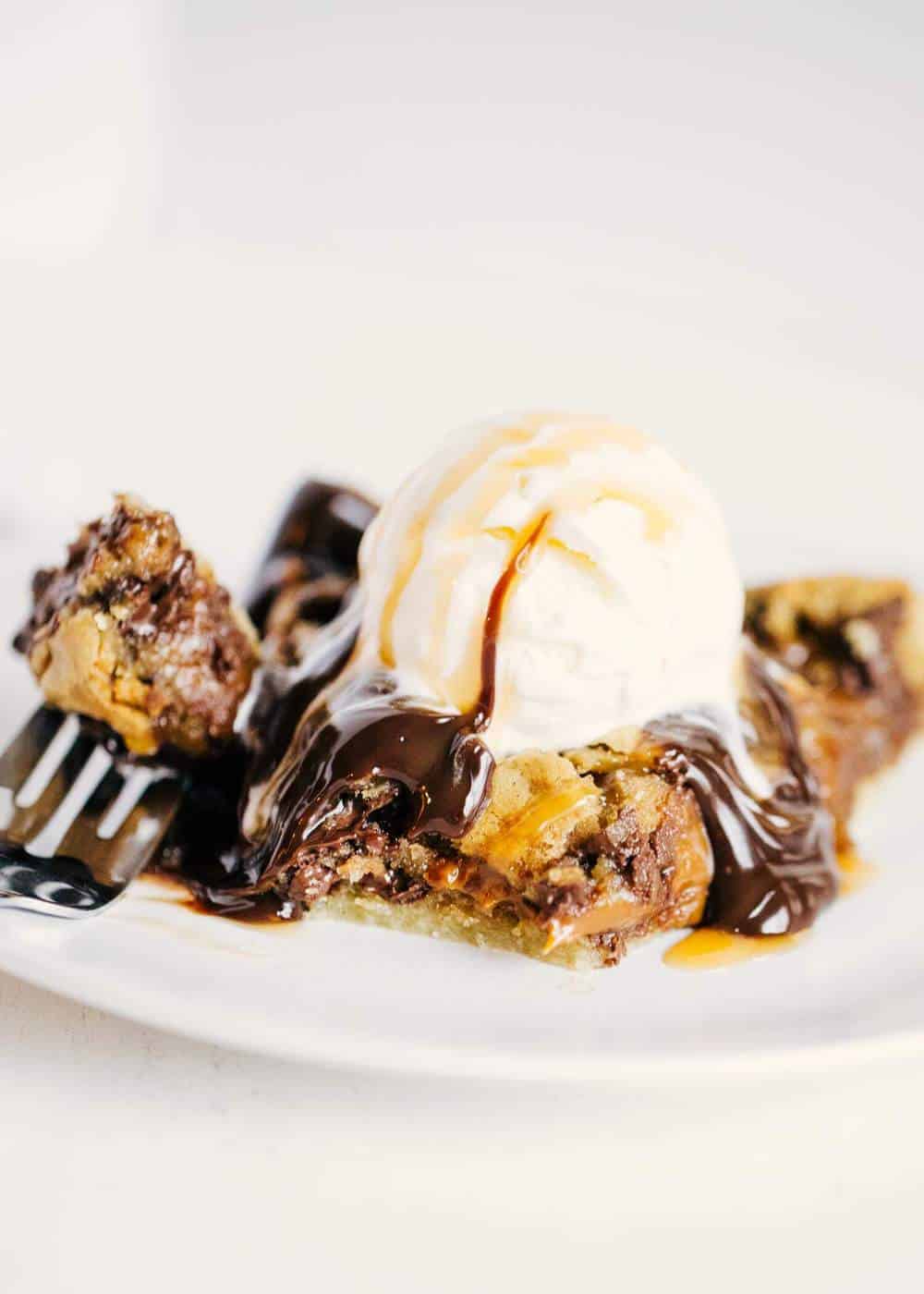 Cookie pie with ice cream and hot fudge.