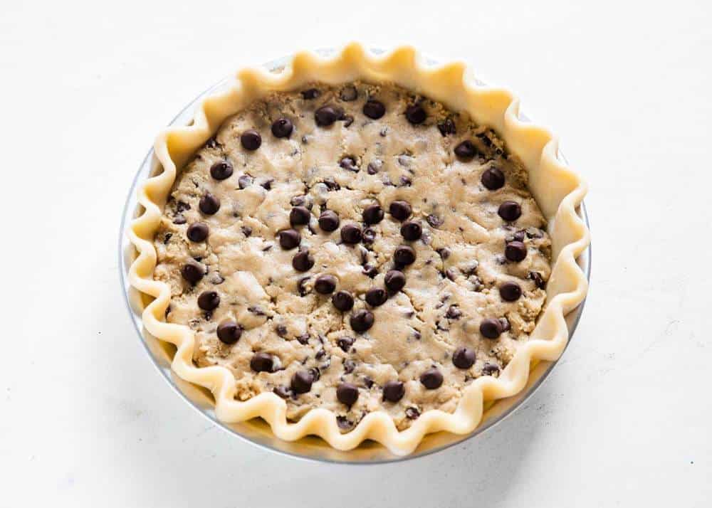 Chocolate chip cookie pie in pie pan. 