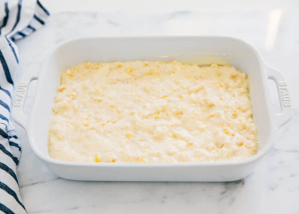 Corn pudding batter in baking dish.