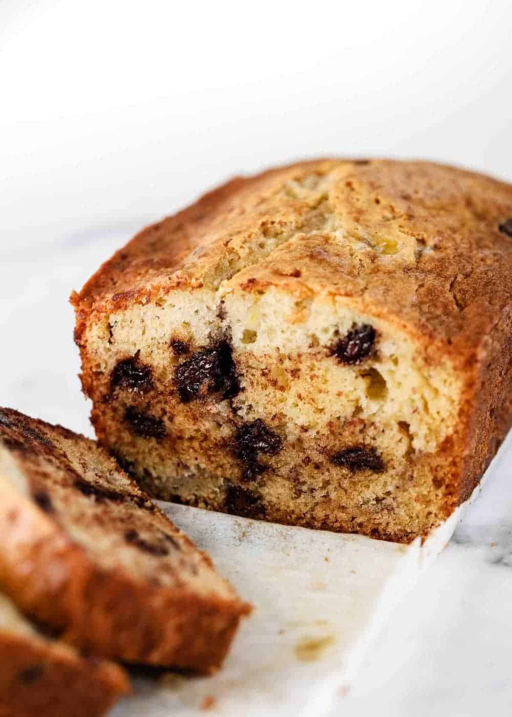 Sliced loaf of chocolate chip banana bread.