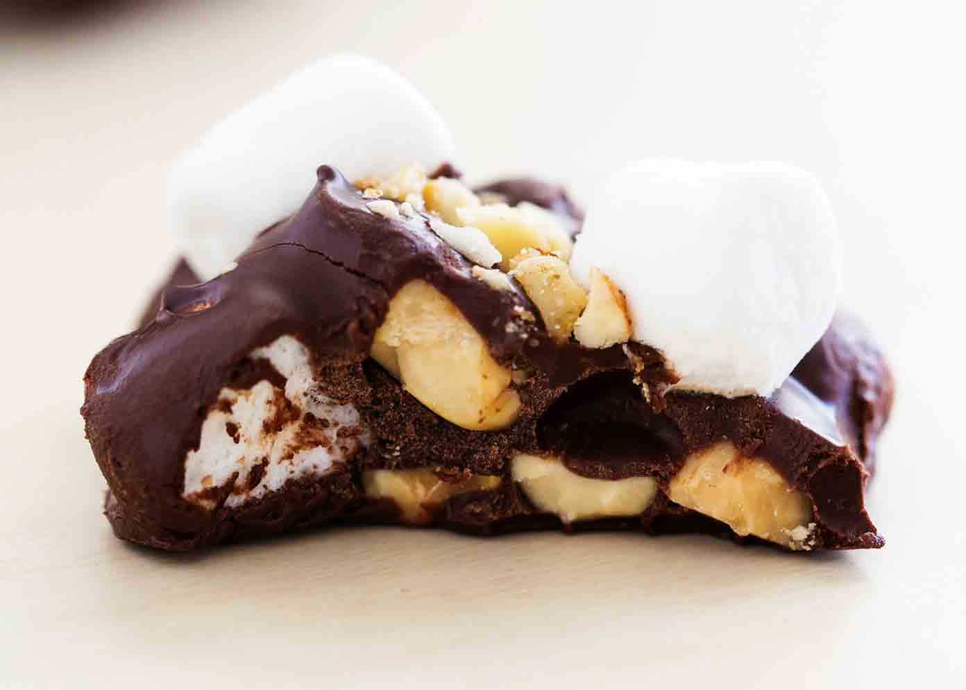 Rocky road candy with a bite out of it. 