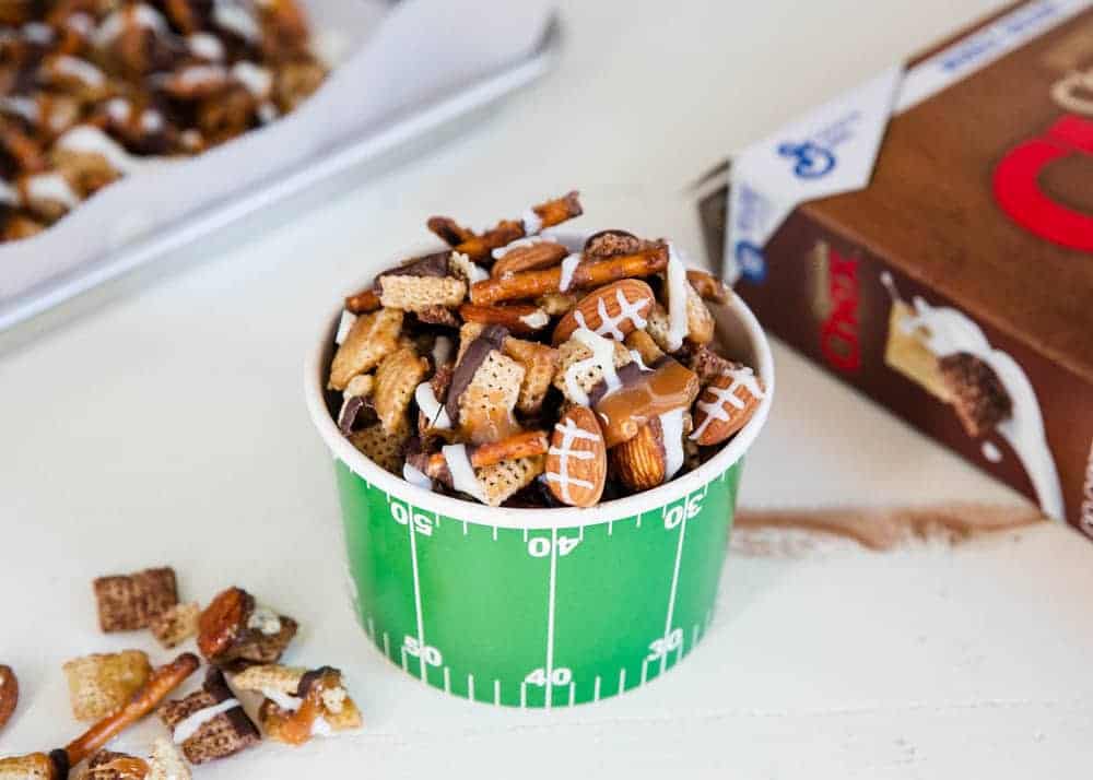 turtle chex mix in a football bucket. 