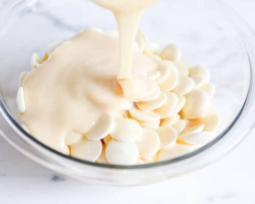 white chocolate and sweetened condensed milk in bowl