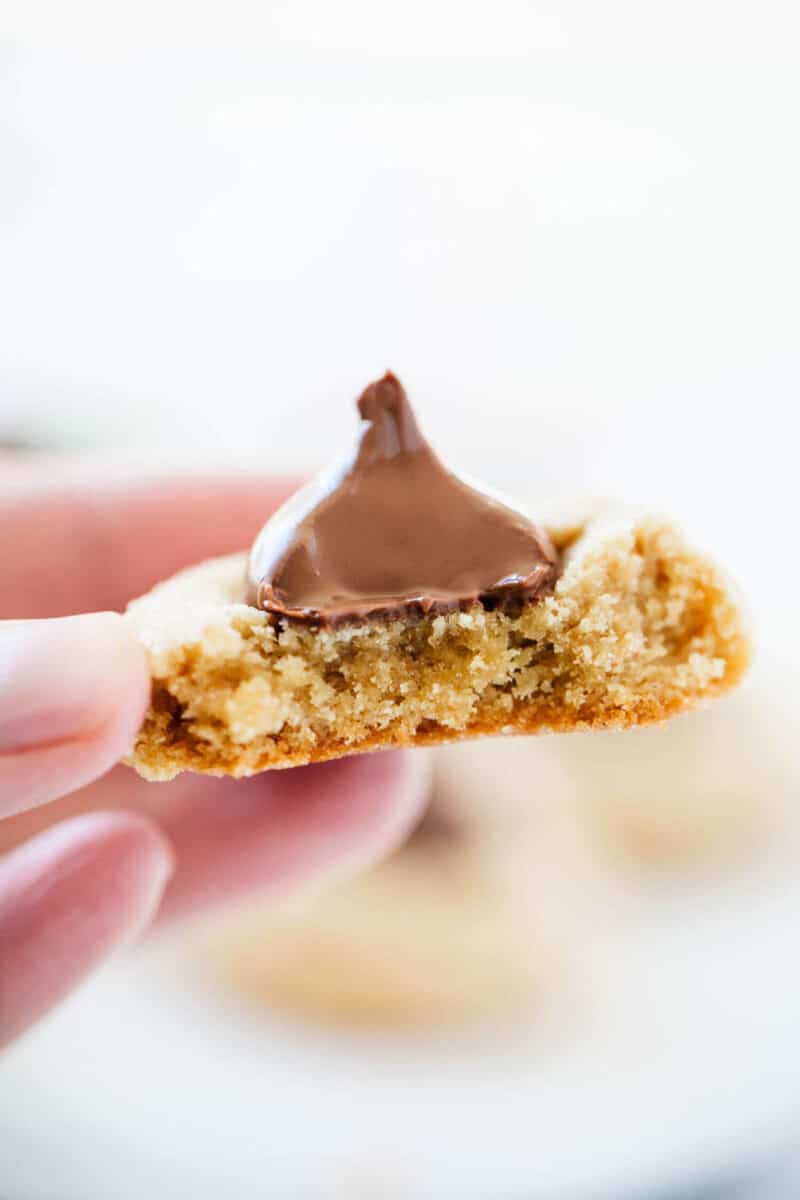 peanut butter hershey kiss cookie with bite taken out 