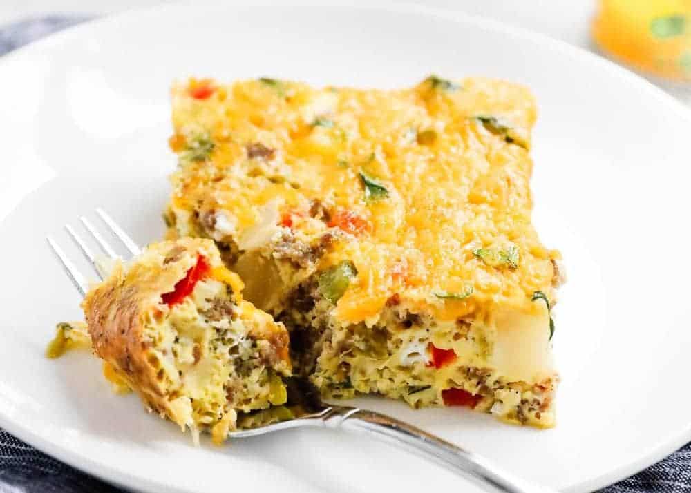 Piece of breakfast casserole on plate.