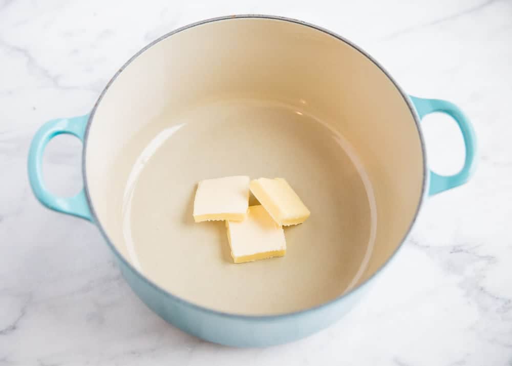 Pieces of butter in pan.