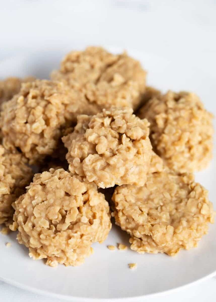 peanut butter no bake cookies stacked on a plate 