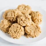 Peanut butter no bake cookies on a plate.