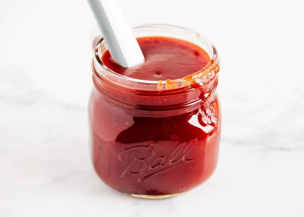 Bbq sauce in glass jar.