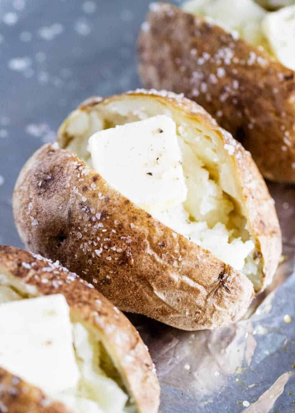 Baked potato with butter on top.