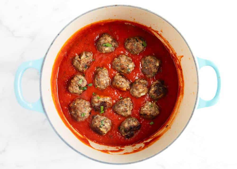 Meatballs in a pot with marinara sauce 