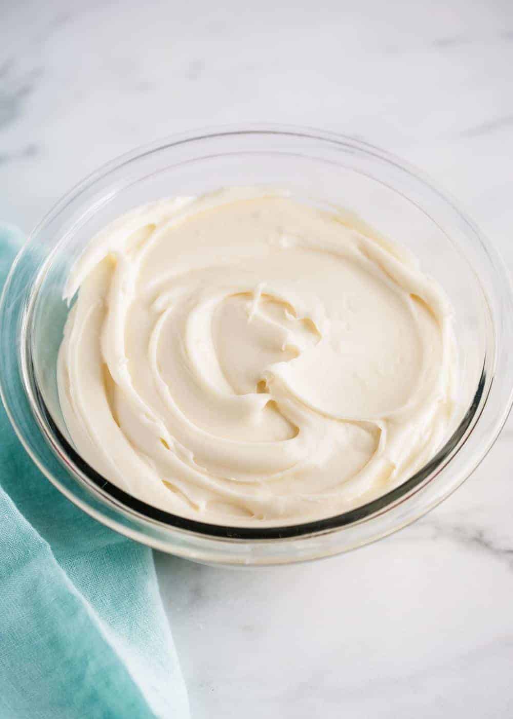 Cream cheese frosting in a bowl.