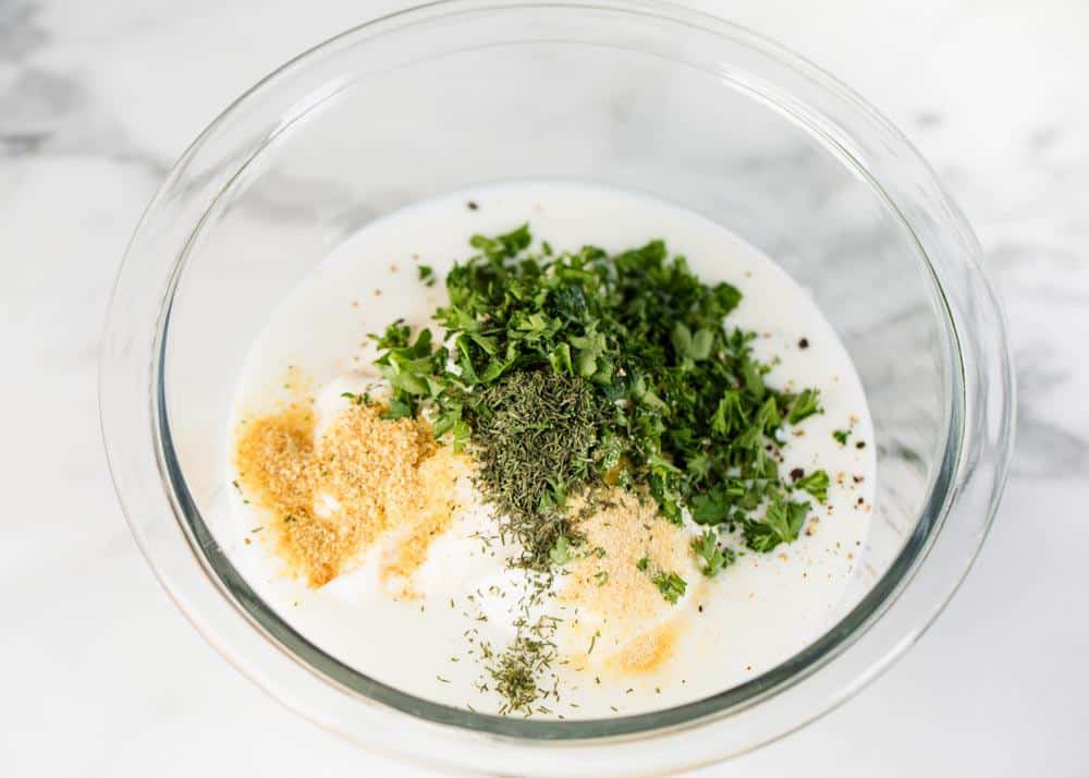 Ranch dressing ingredients in a bowl.