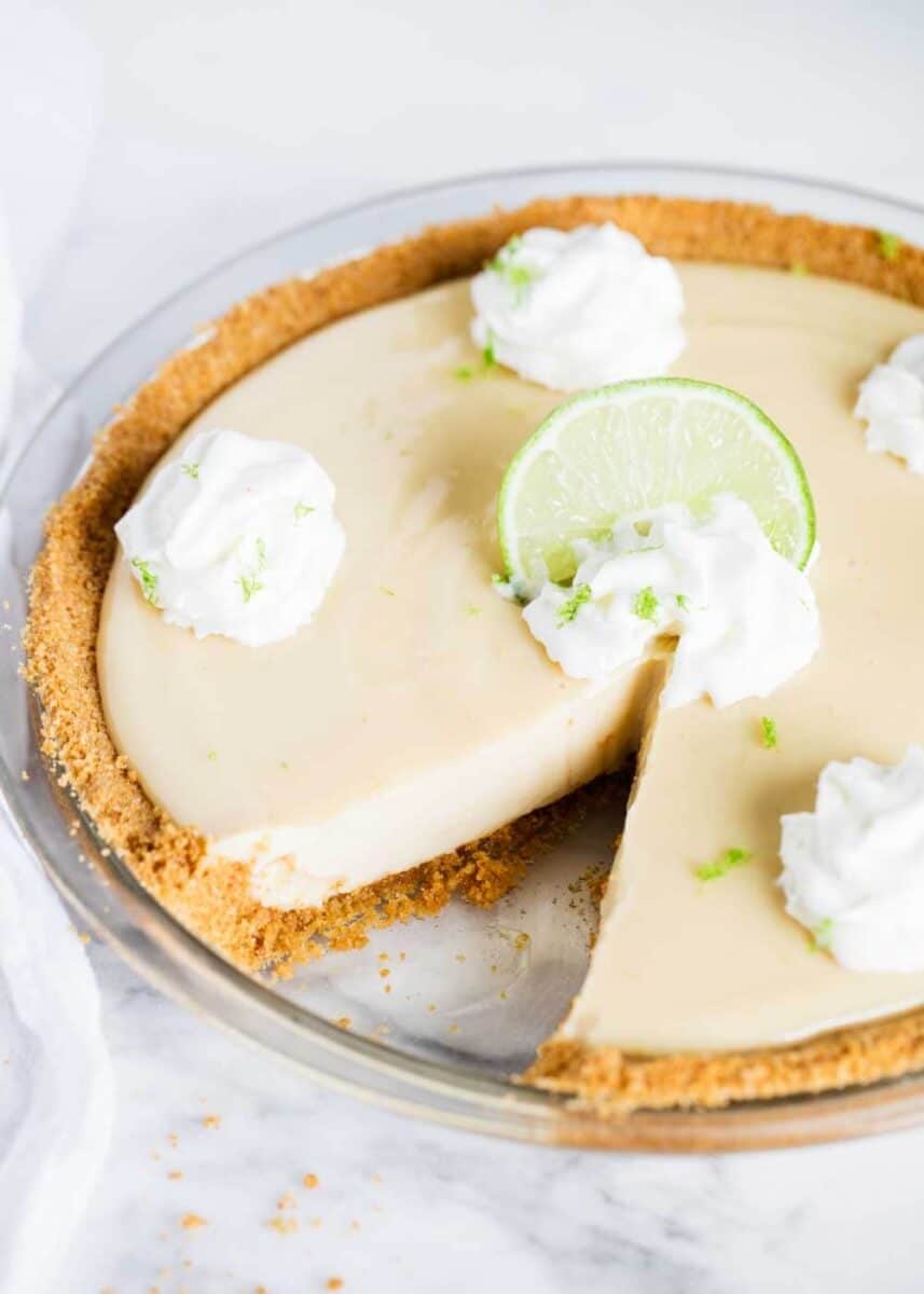 key lime pie with a slice removed