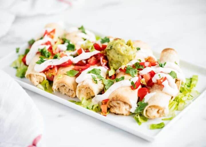 baked chicken taquitos on plate 