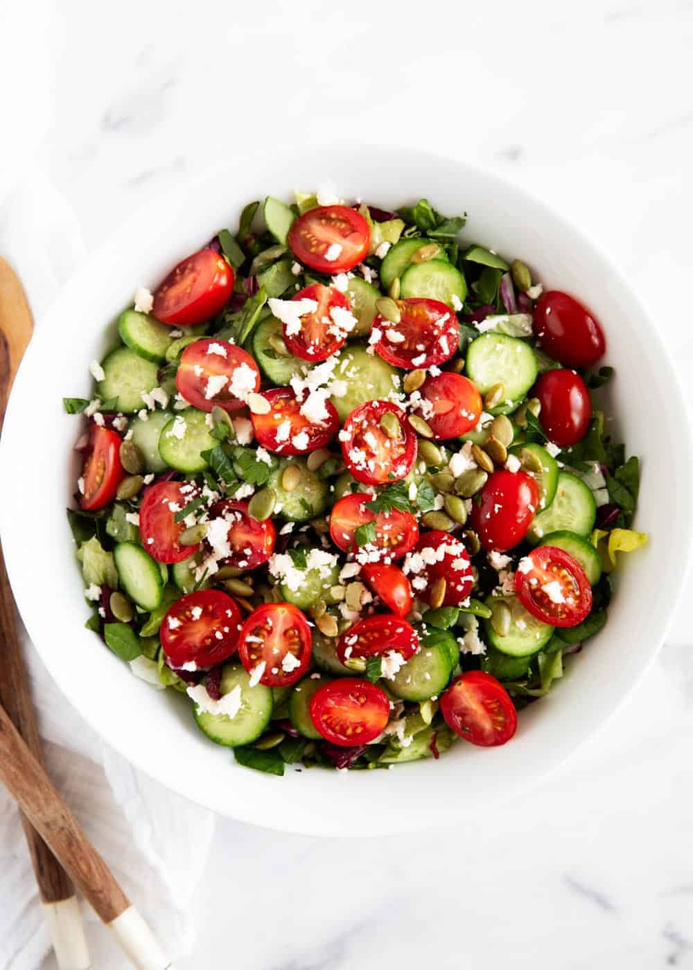 Close up of chopped salad in bowl.