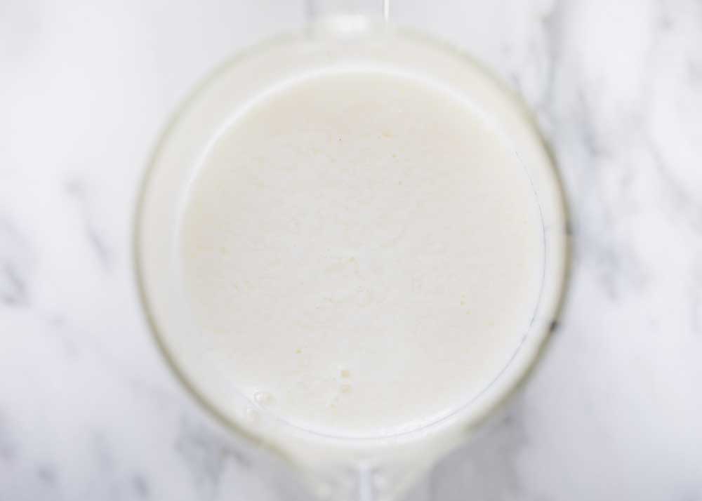 Over head shot of curdled buttermilk. 