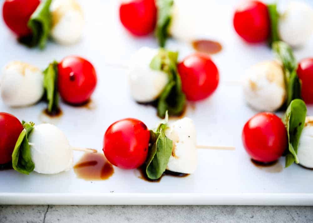 Caprese kabobs on a sheet pan. 