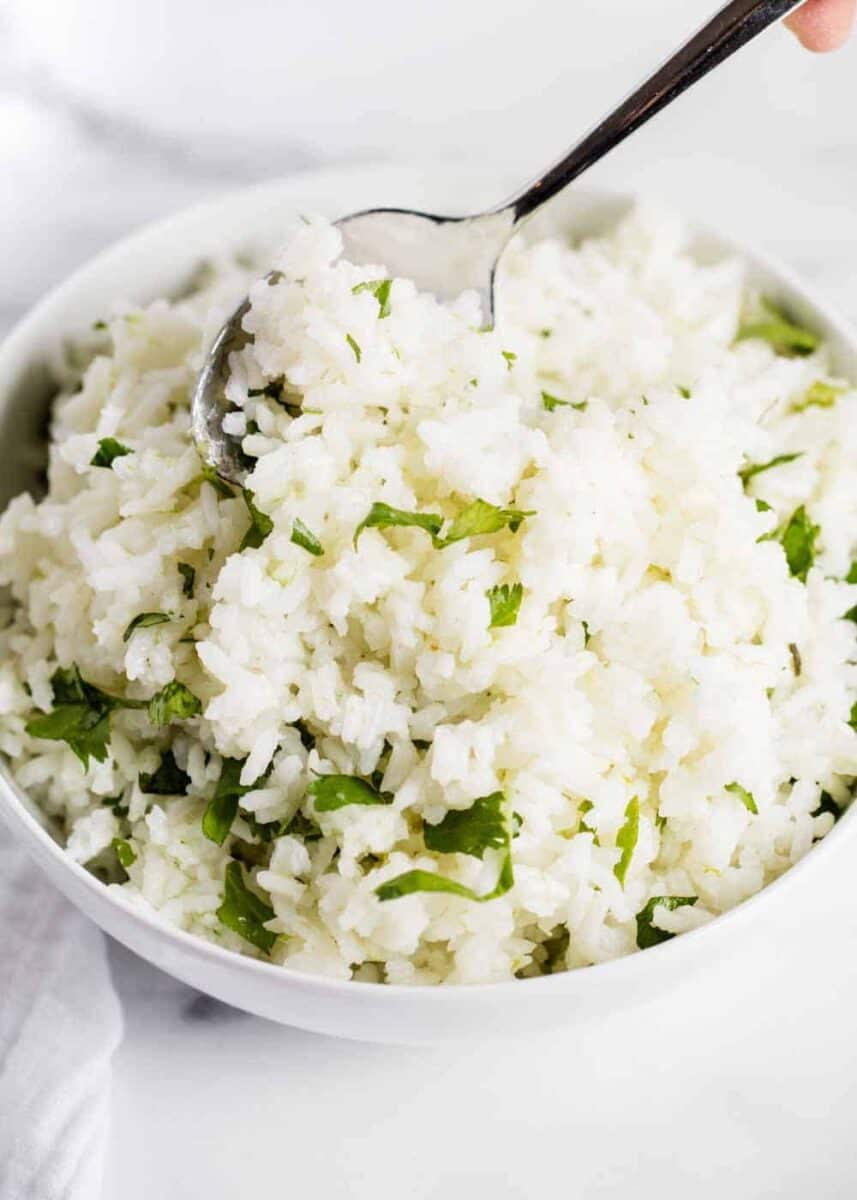 bowl of cilantro lime rice with spoon 