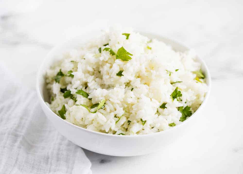 Cilantro lime rice in white bowl.
