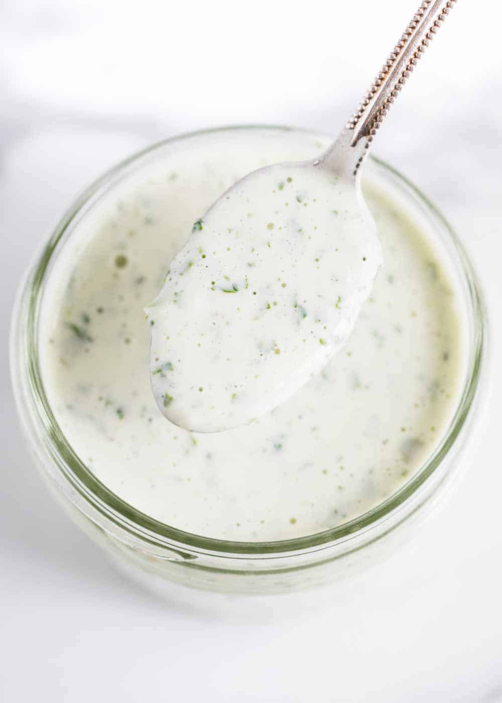 Spoonful of creamy cilantro lime dressing.