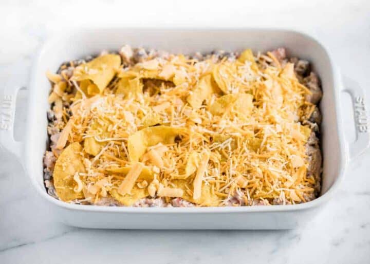 mexican chicken casserole in pan ready to bake 