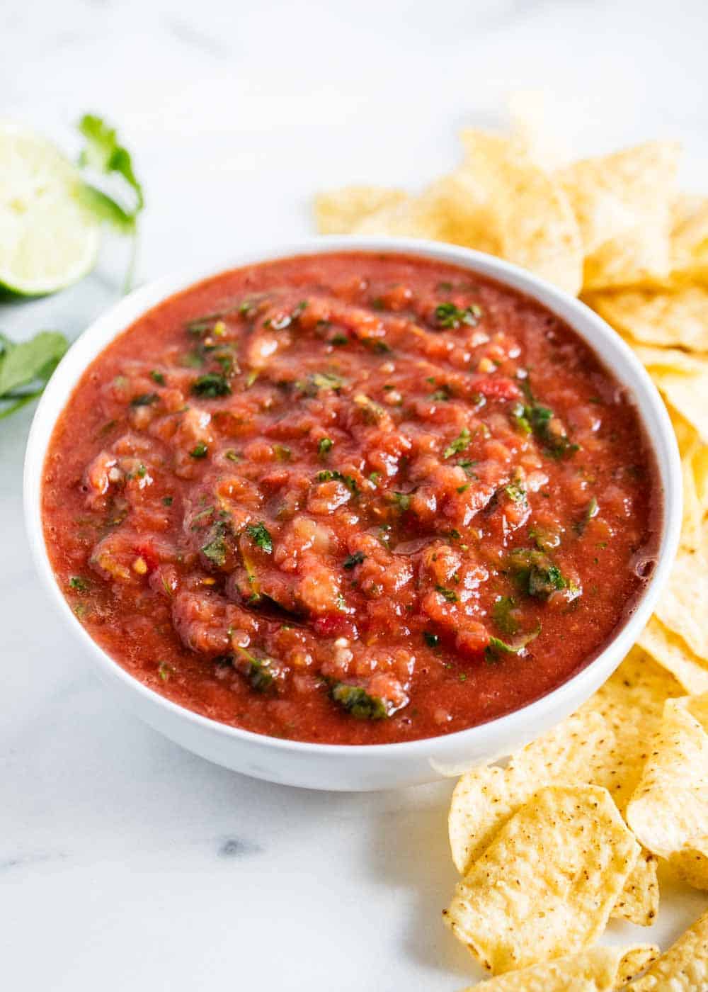 Bowl of salsa with tortilla chips.