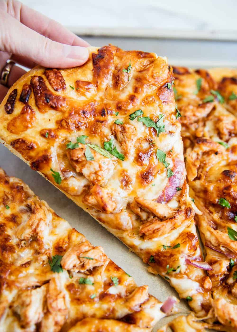 Piece of bbq chicken pizza.