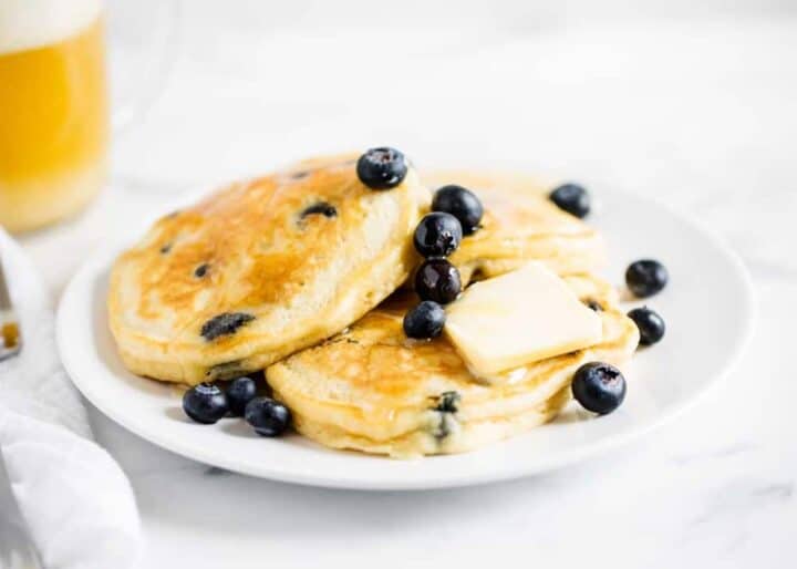 blueberry pancakes on plate 