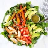 fajita chicken salad in white bowl