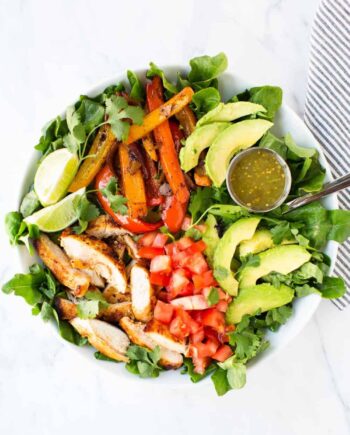 fajita chicken salad in white bowl