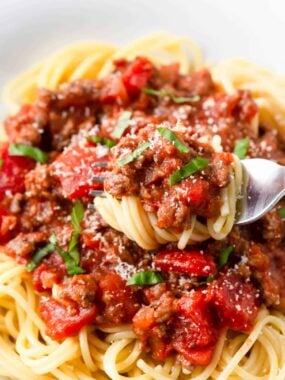 Spaghetti twirled in a fork.